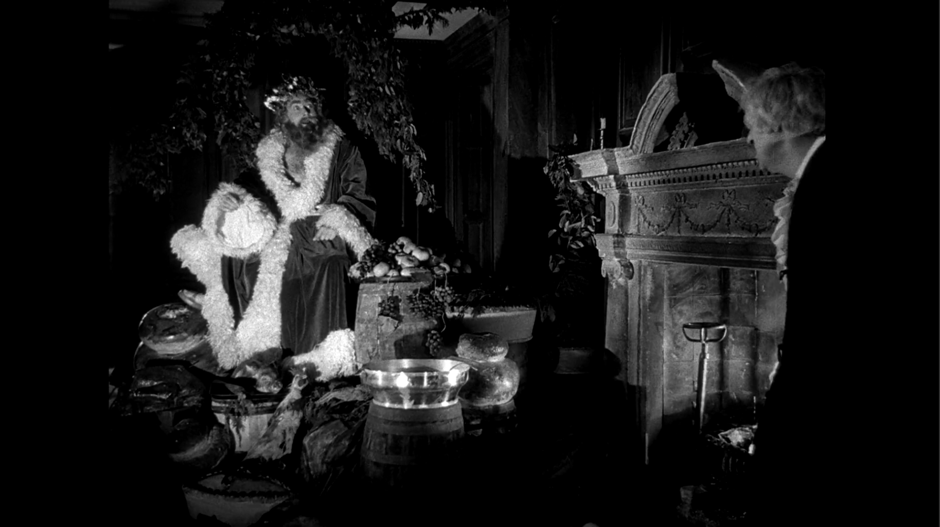 Screen grab of Scrooge meeting the Ghost of Christmas Present, from 1951 movie A Christmas Carol