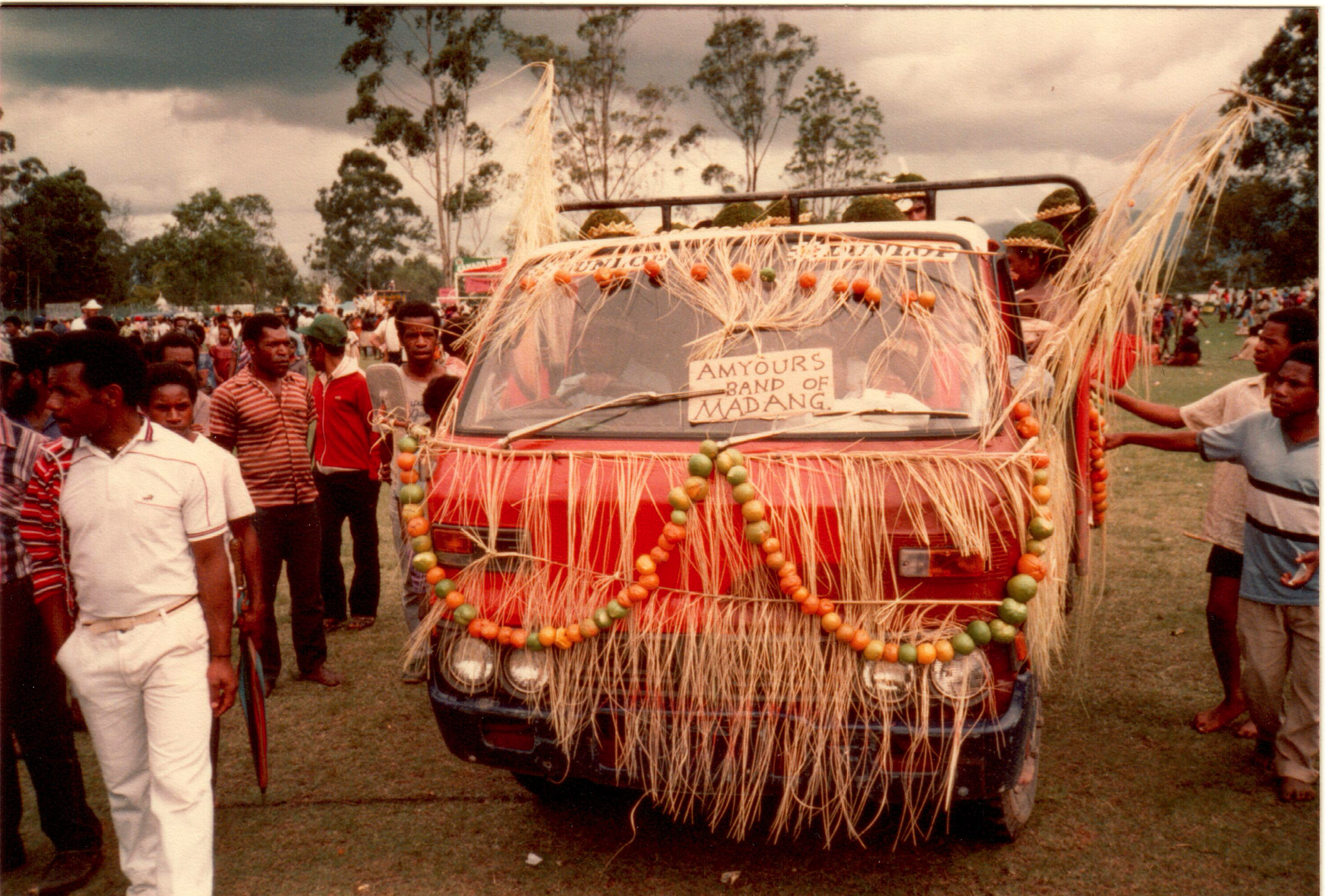 decorated pickup truck of Amyours Band of Madang at Goroka Highlands show, Papua New Guinea, 1984