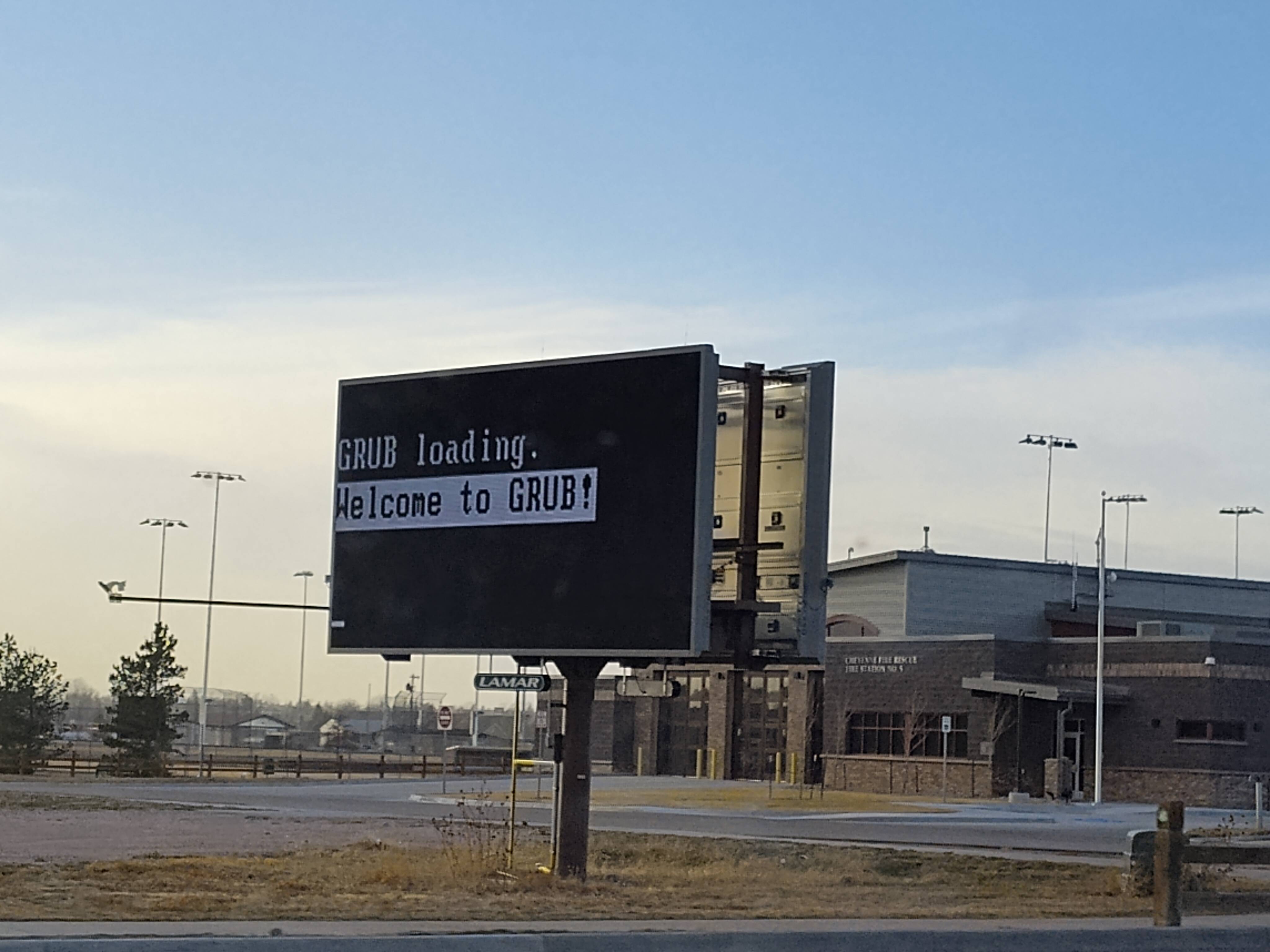 eletronic sign showing Welcome to GRUB on it instead of whatever