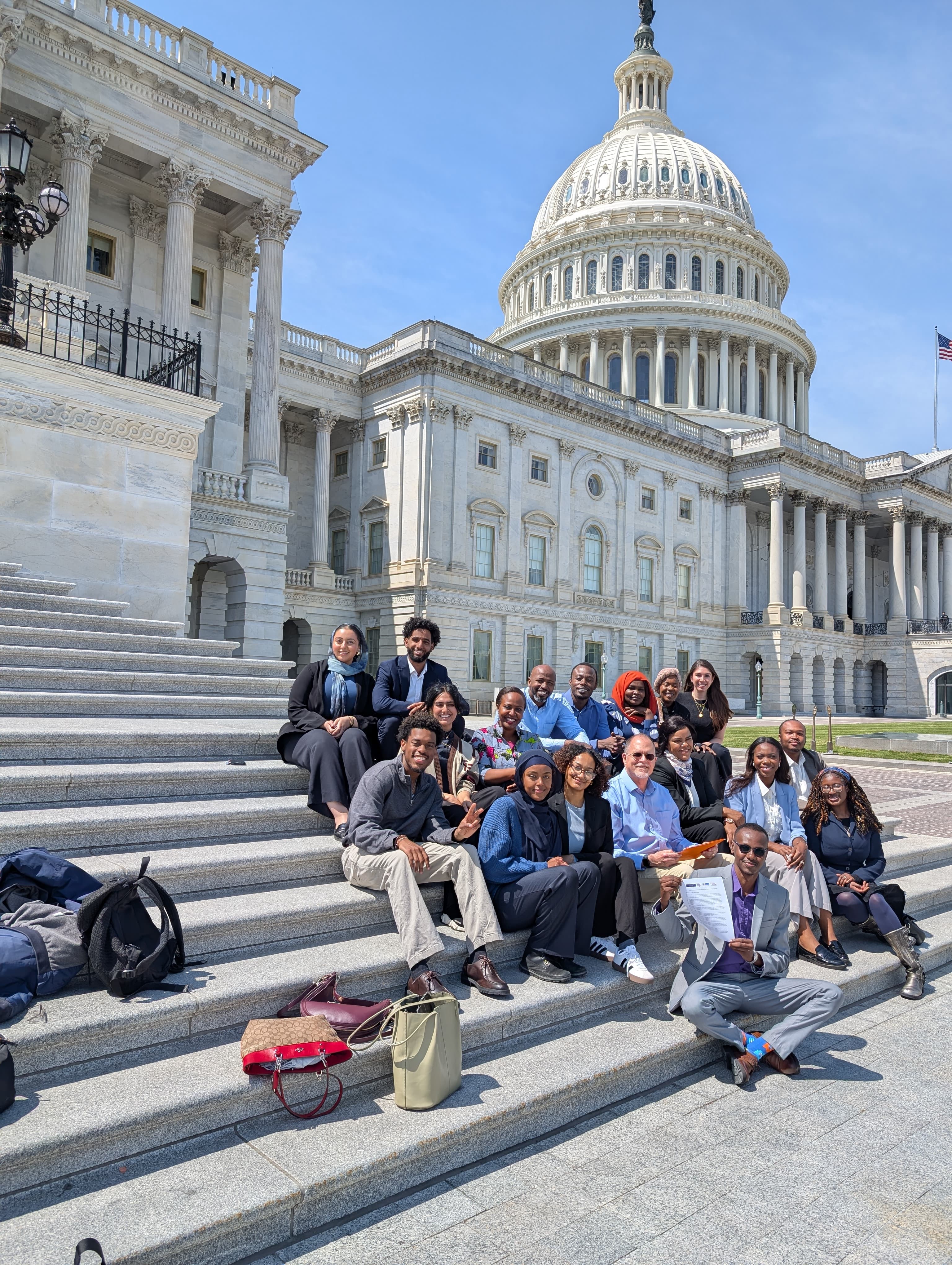 group of volunteers from Sudan Advocacy Week on the steps of the US Capitol
